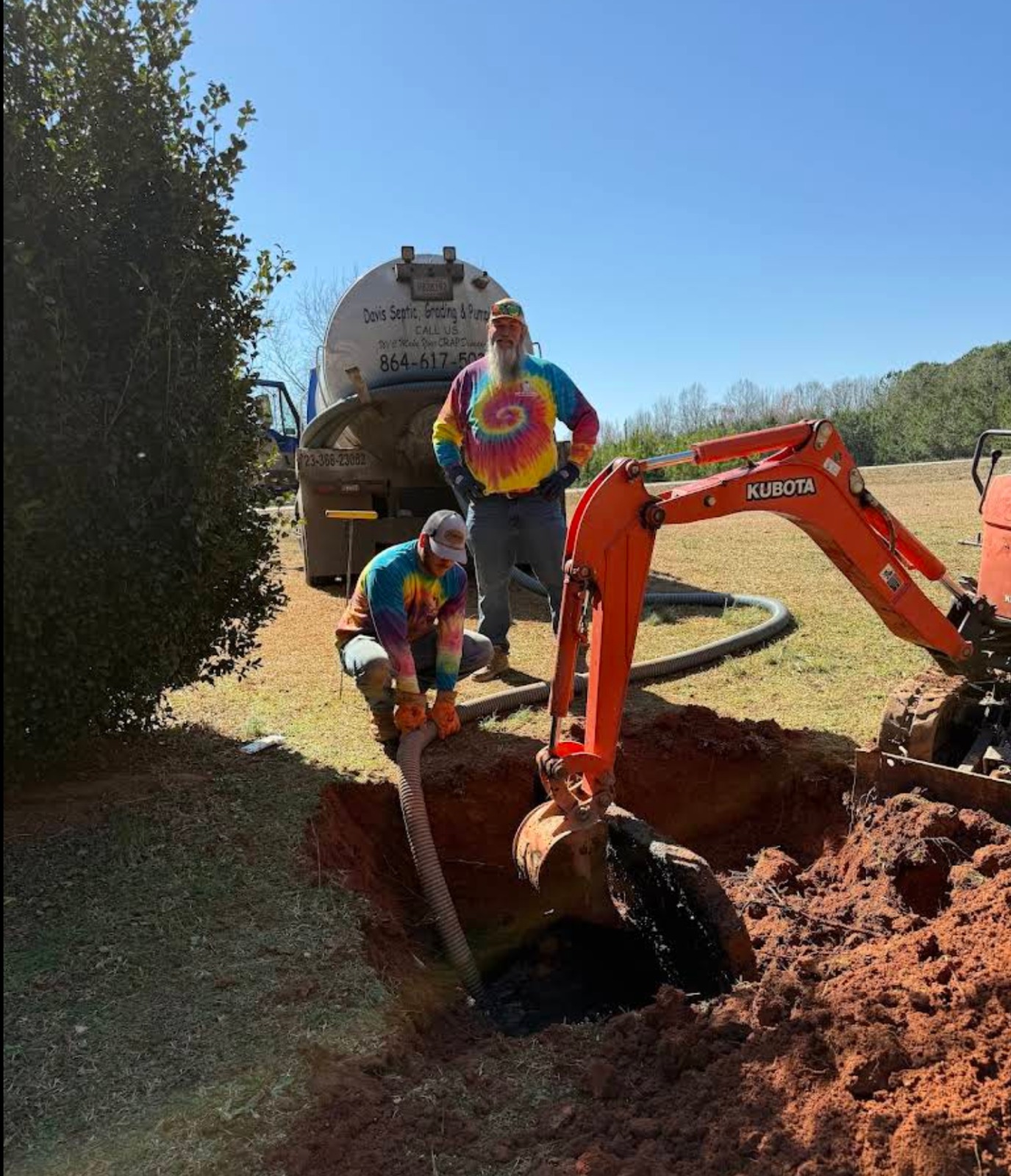 Concrete septic tank uncovered for pumping